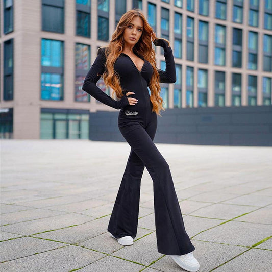 Dame jumpsuit i sporty look med hætte og vidde ben Stilla