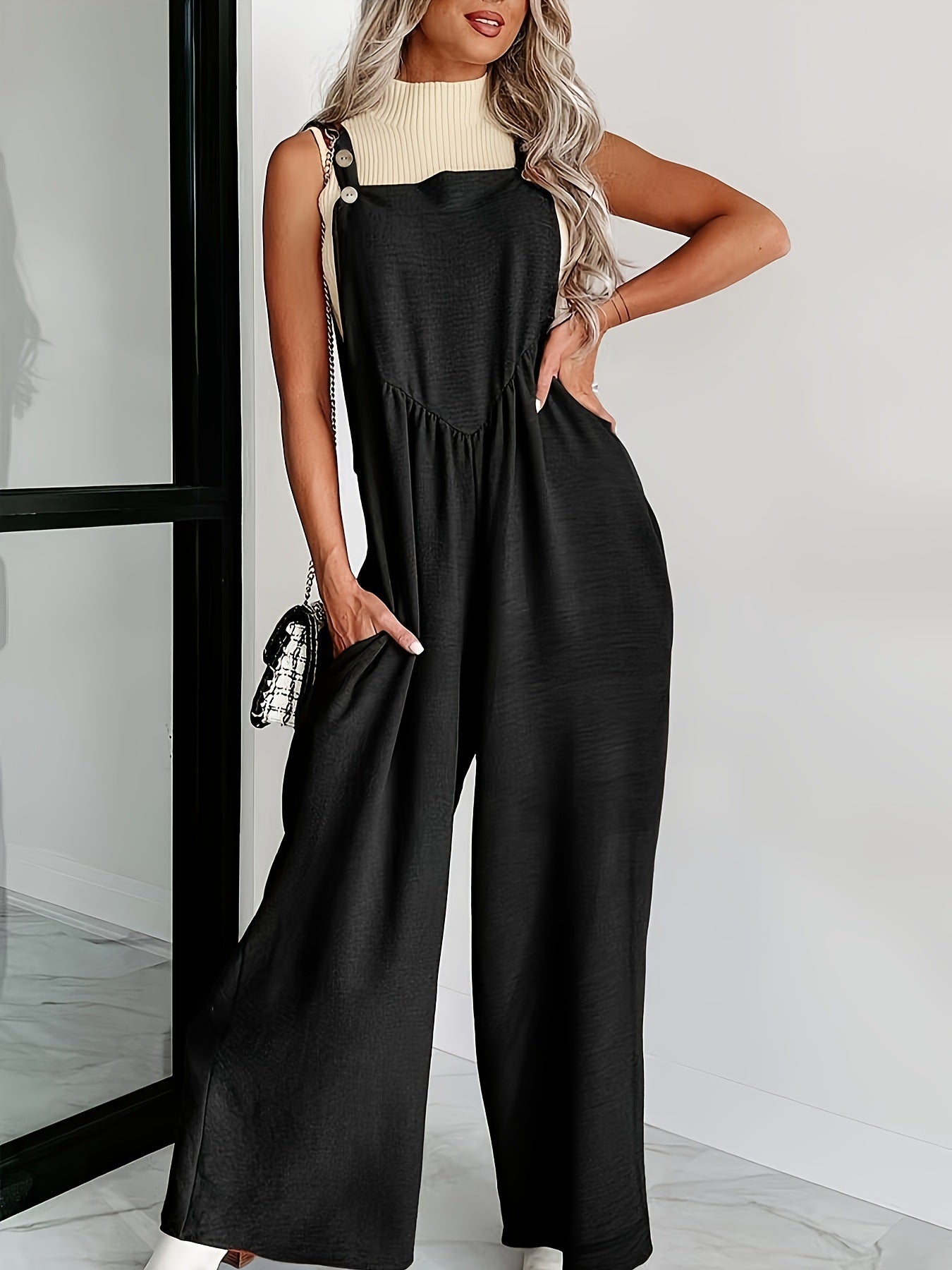 Dame casual jumpsuit med justérbare skulderstropper og sidelommer Stilla