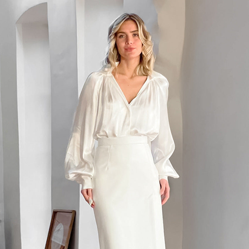 Dame elegant bluse med voluminøse ærmer og dyb v-hals Stilla