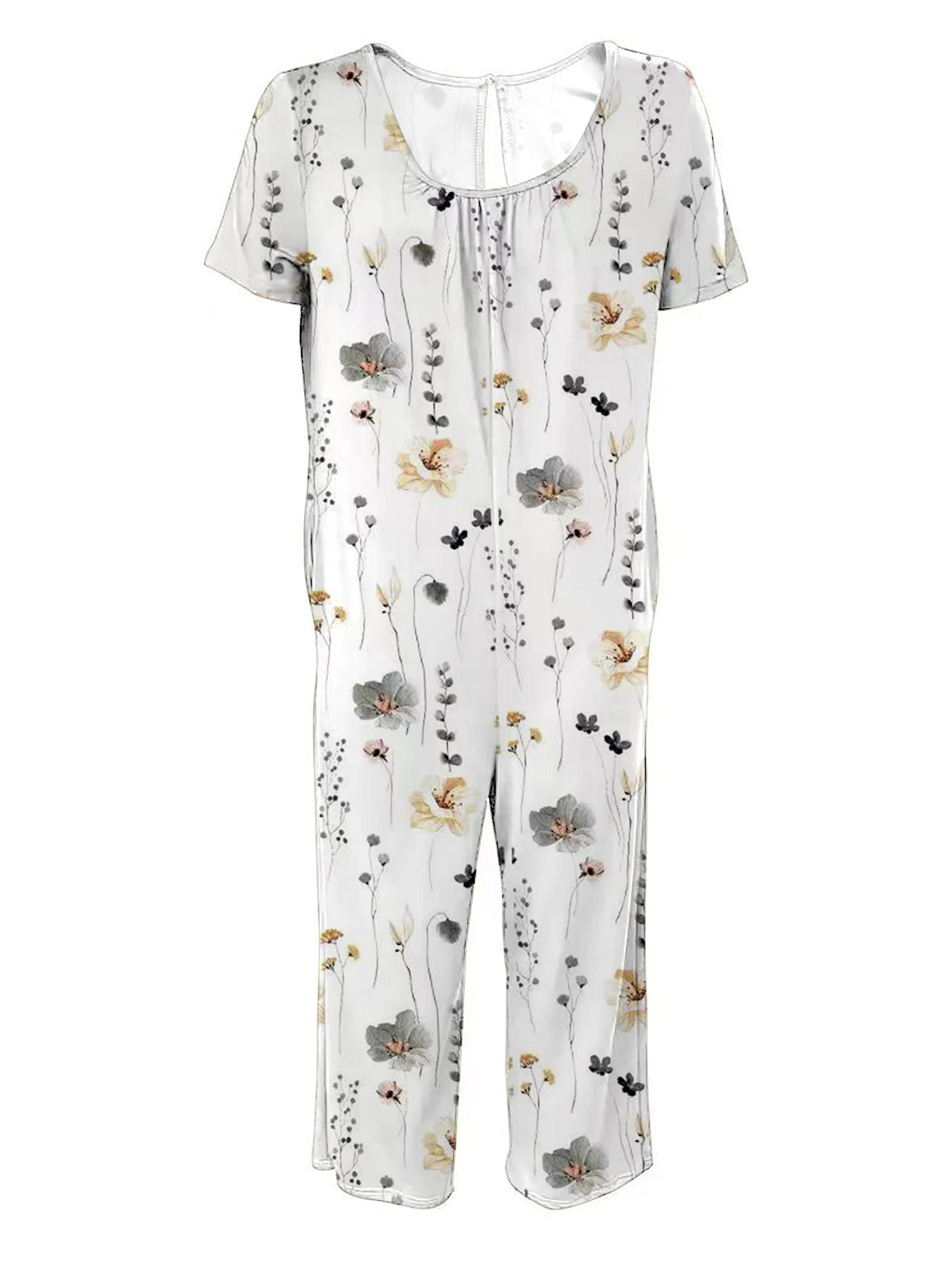 Damer bred blomster-jumpsuit med lommer og bådudskæring Stilla