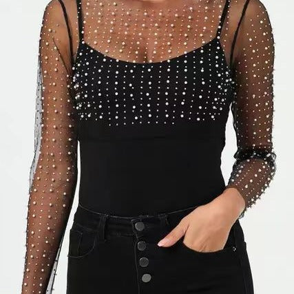 Dame elegant bodysuit med transparente ærmer og glitrende detaljer Stilla