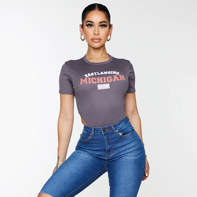 Dame bodysuit med kreativt bymotiv og højfølsom stofkvalitet Stilla