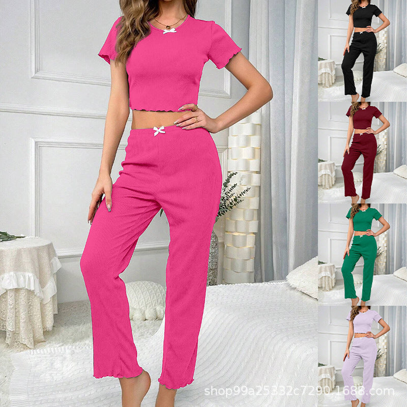 Dame fritids-jumpsuit med moderne ribdesign og legende sløjfedetalje Stilla