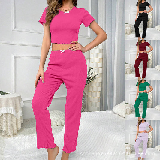 Dame fritids-jumpsuit med moderne ribdesign og legende sløjfedetalje Stilla