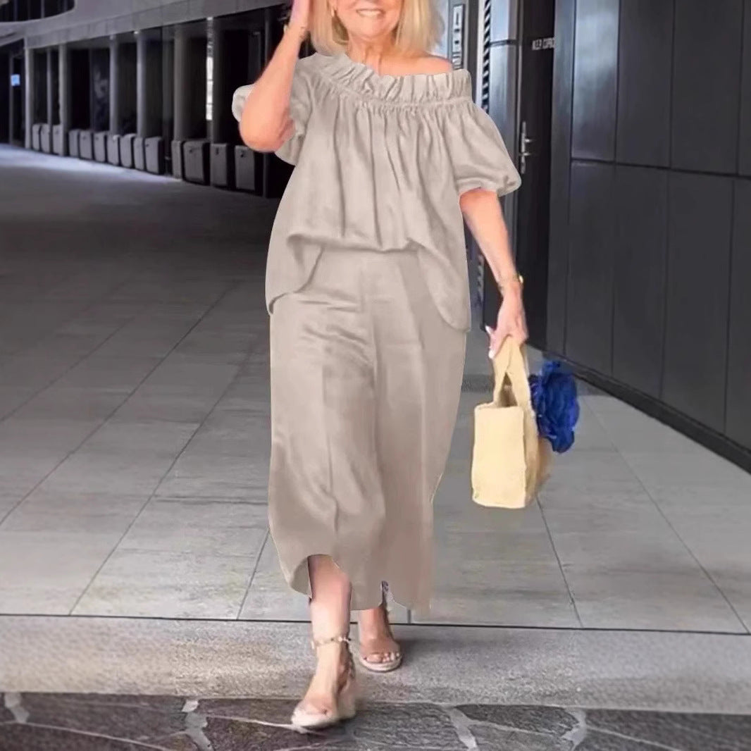 Dame luftig jumpsuit-sæt med voluminøse ærmer og raffineret taljering Stilla