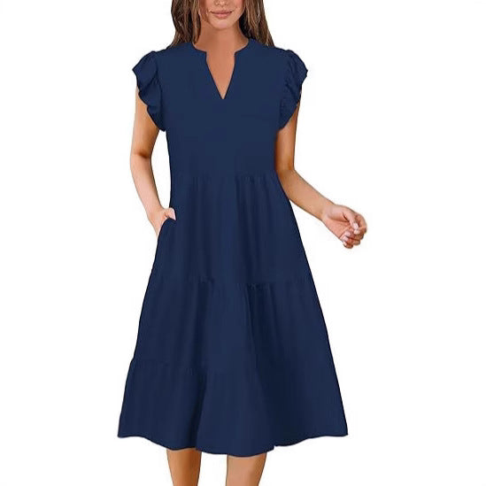 Dame afslappet flæsekjole med lomme og V-udskæring Stilla