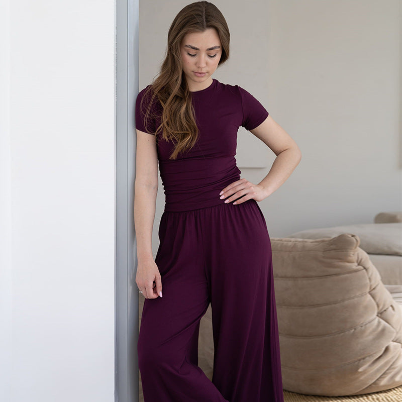 Dame elegant jumpsuit med figursyet overdel og vidde ben Stilla