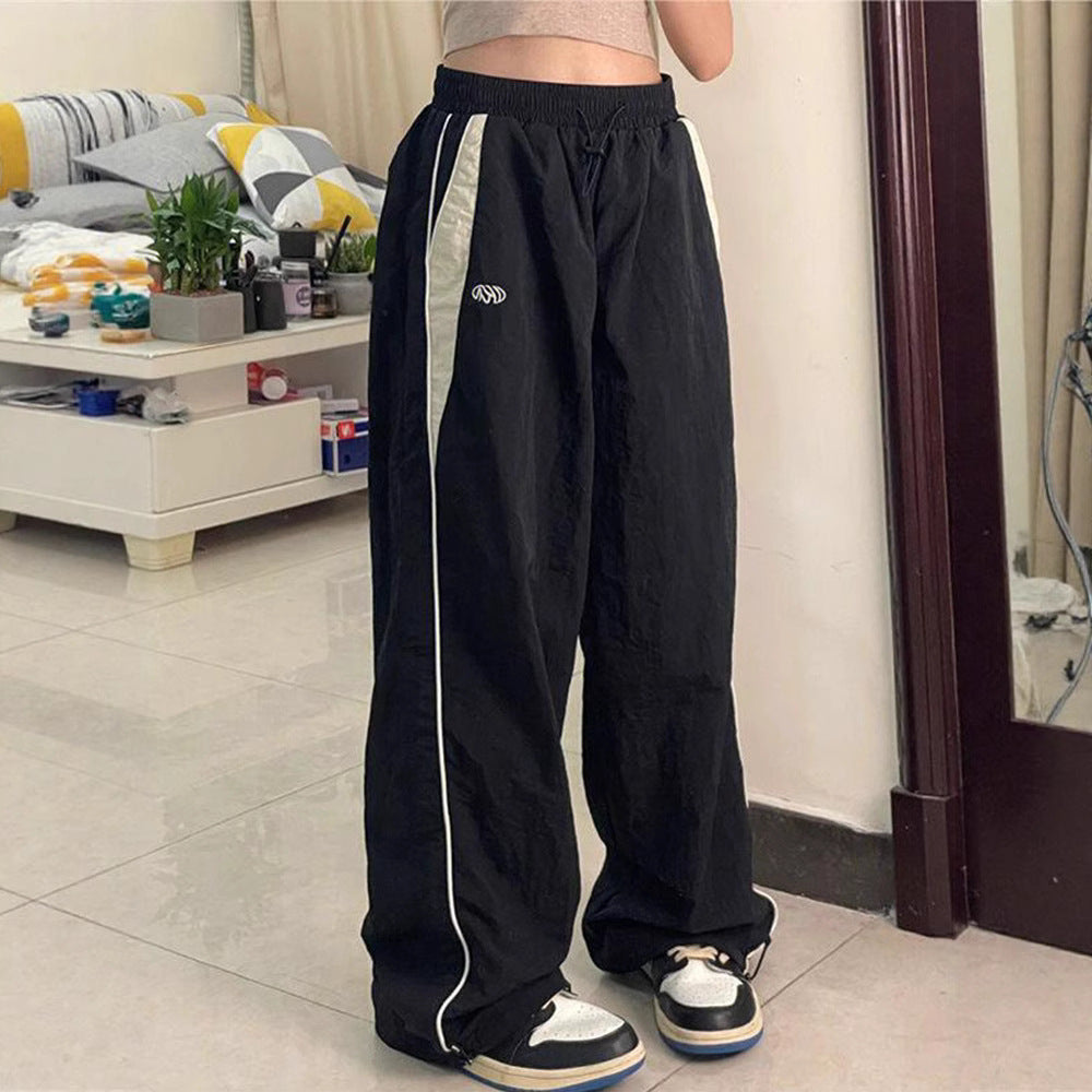 Dame afslappede sportbukser med elastisk talje og sidelange striber Stilla