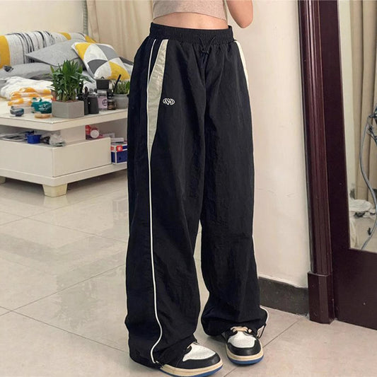 Dame afslappede sportbukser med elastisk talje og sidelange striber Stilla