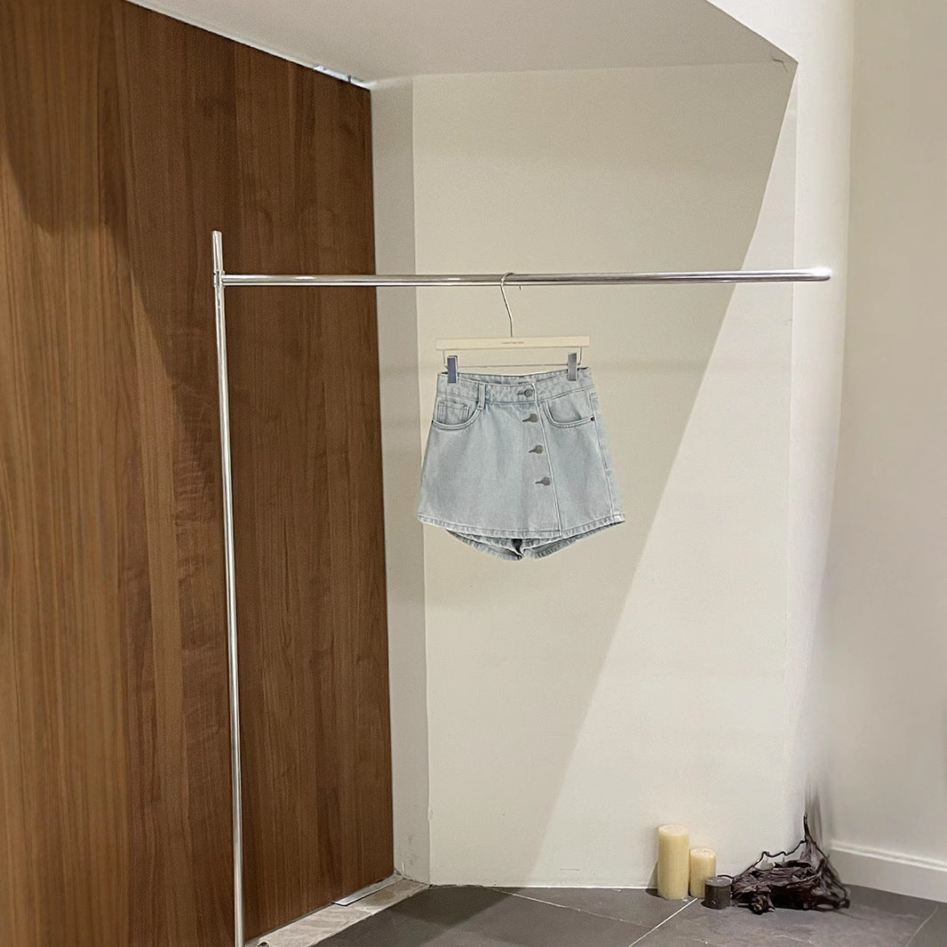 Dame Denim-shorts med knaplukning og let vintage-look Stilla