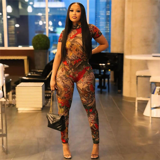 Dame Mode jumpsuit lavet af gennemsigtigt materiale med elegant mønster Stilla