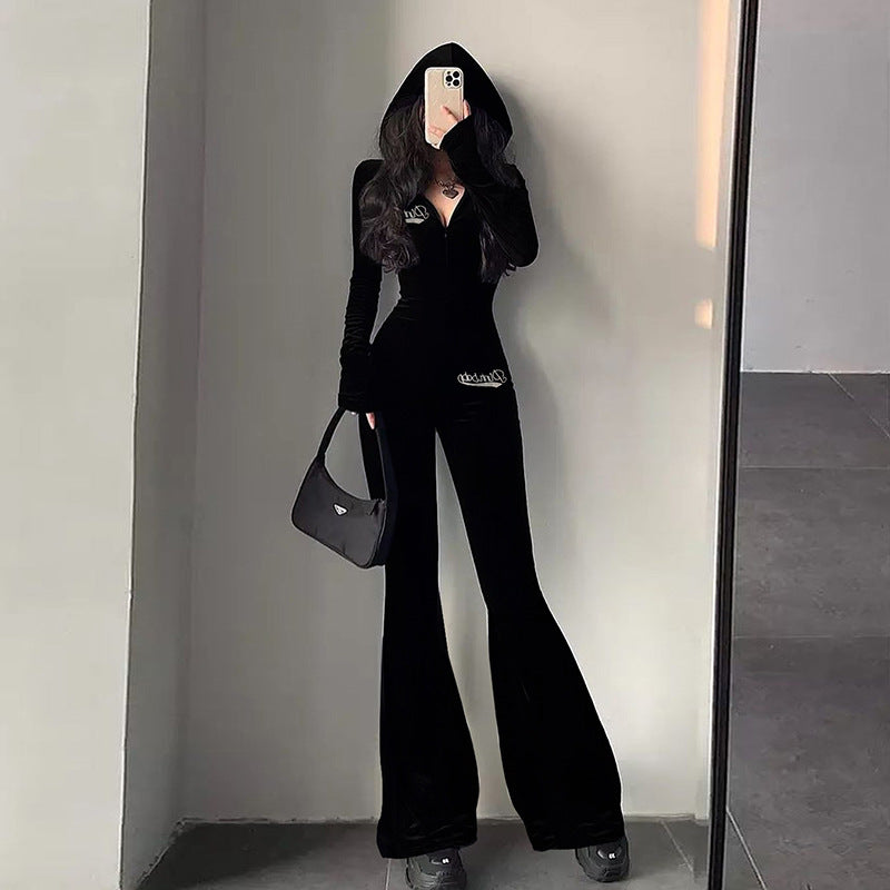 Dame jumpsuit i sporty look med hætte og vidde ben Stilla