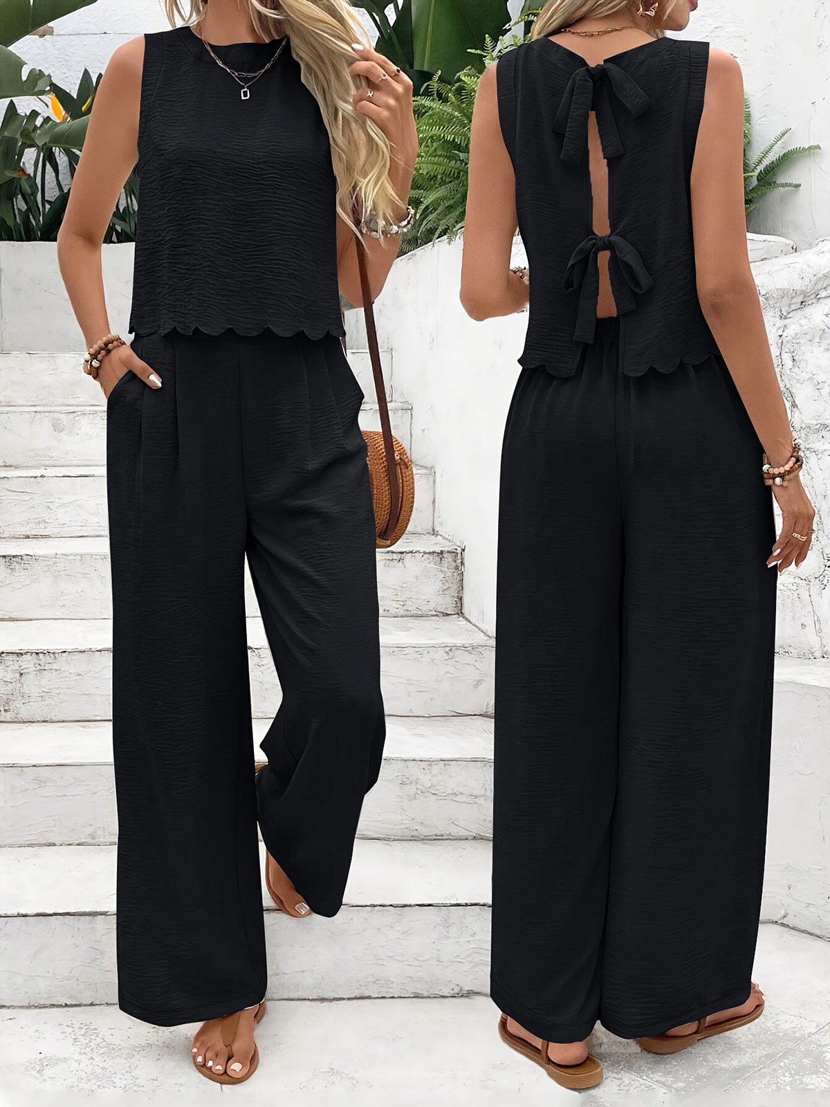 Dame afslappet jumpsuit med elegant laceindsats og bred ben Stilla