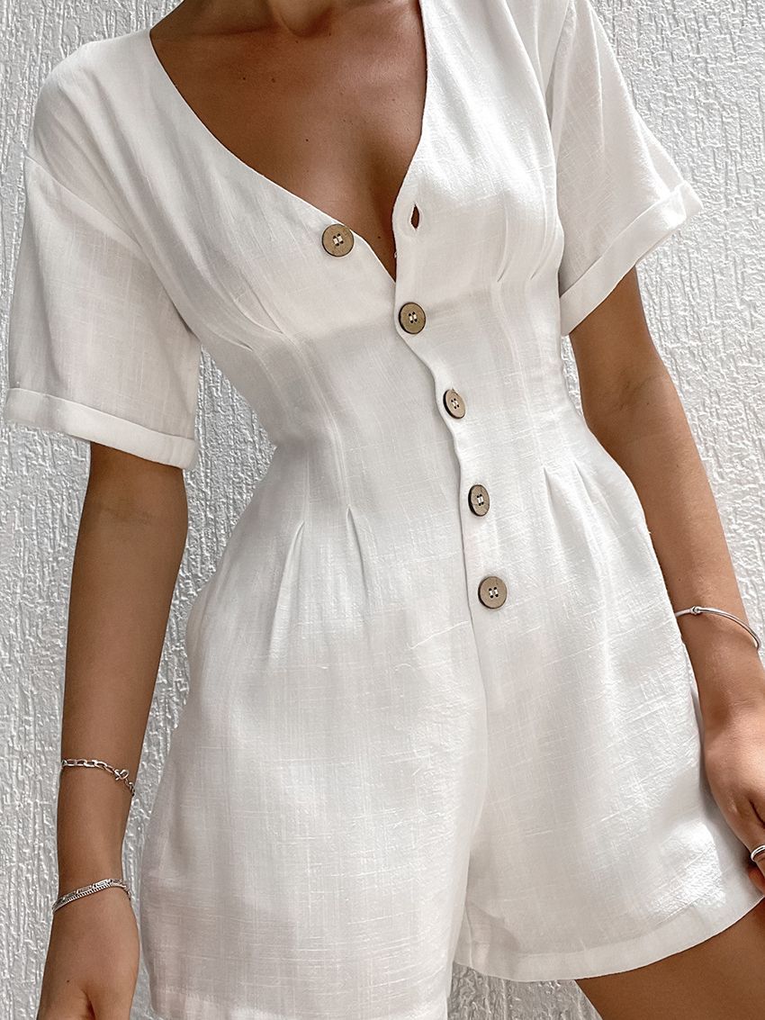 Dame jumpsuit med smart V-udskæring og knapdekoreret front Stilla