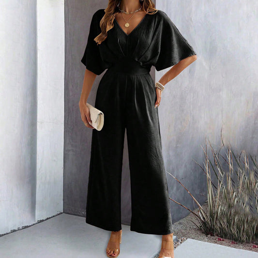 Dame Bredskåret Jumpsuit med elegante Draperinger og V-udskæring Stilla