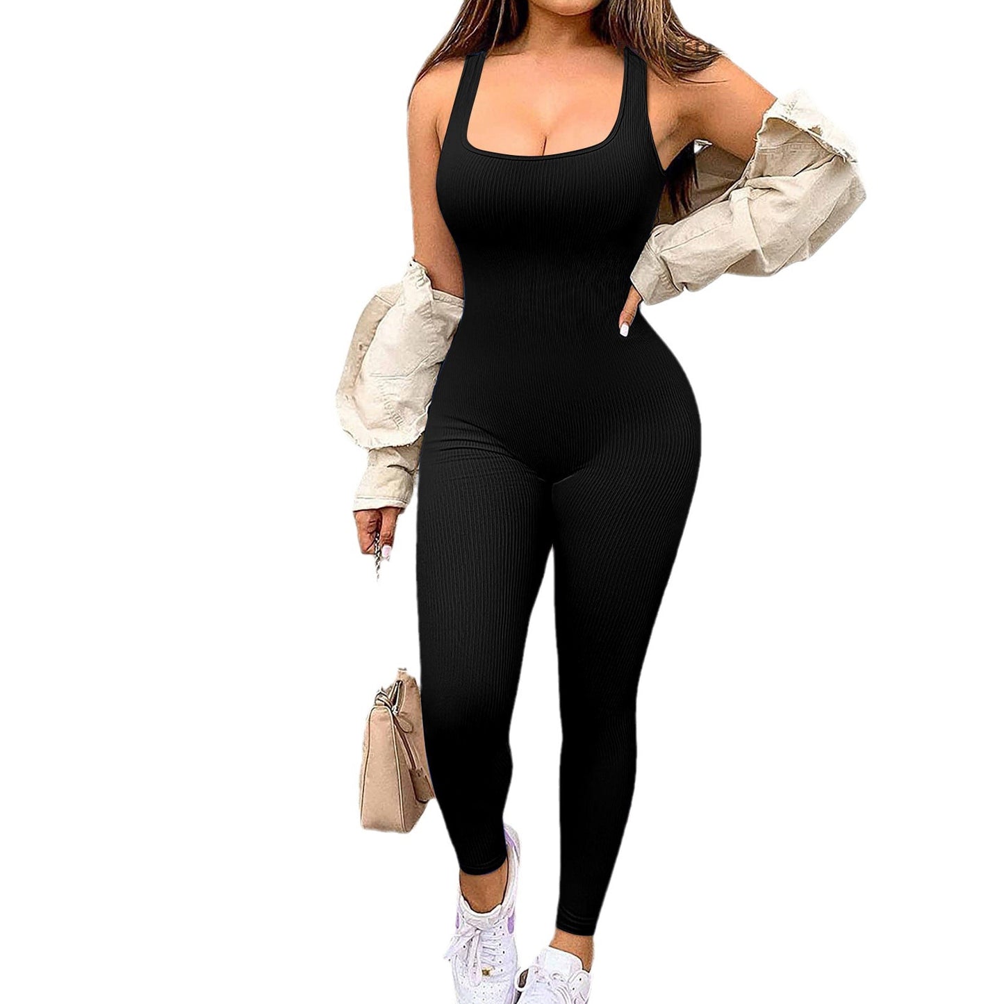Dame enhed jumpsuit med figurtilpasset design og moderne ribmønster Stilla