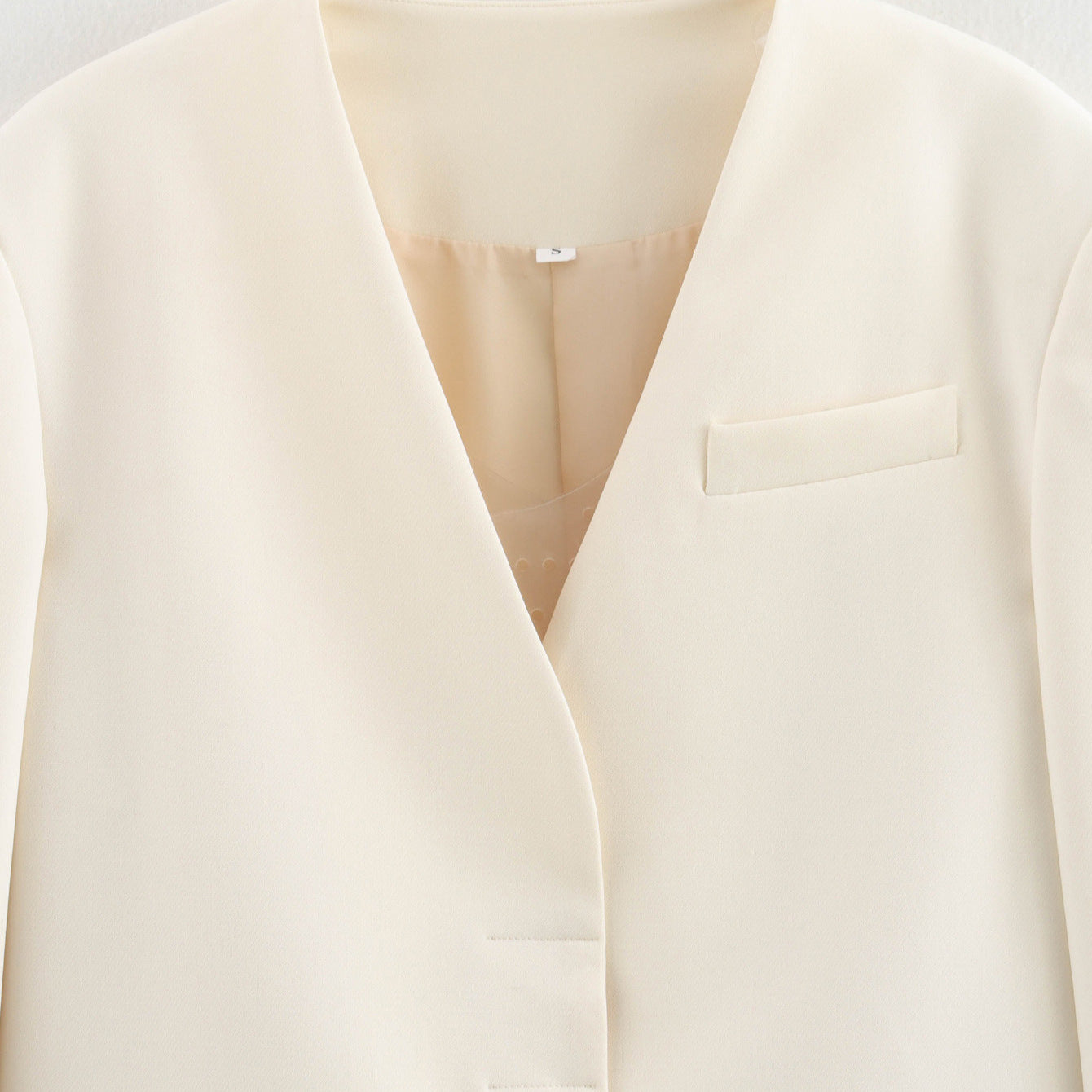 Dame elegant Bouclejakke med moderne snit og integrerede lommer Stilla