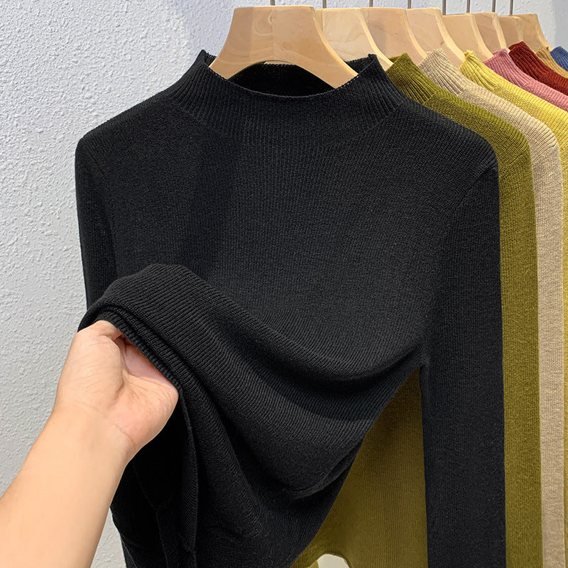 Dame pullover med høj ståkrave og fin ribstruktur Stilla