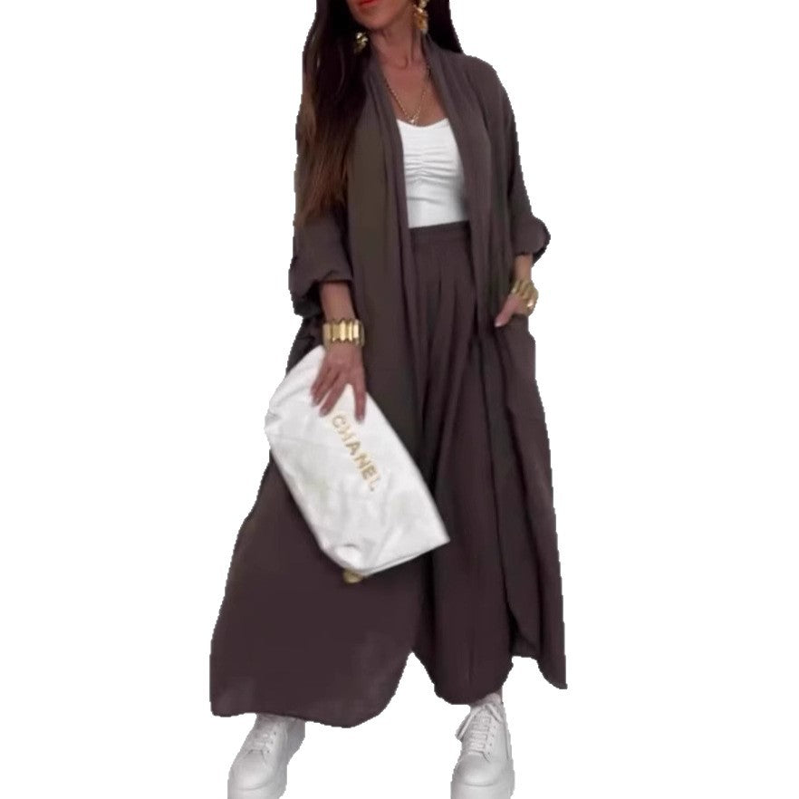 Dame afslappet lang frakke med vid snit og praktiske lommer Stilla