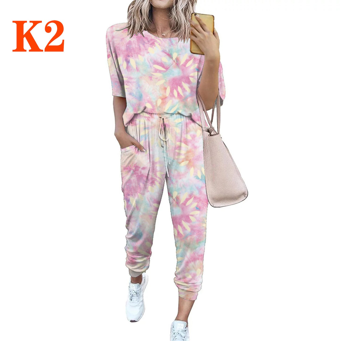 Dame afslappet jumpsuit med blomsterprint og elastisk bånd Stilla