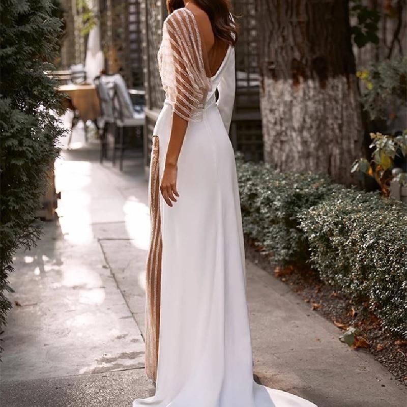 Damer Elegant Couture Jumpsuit med asymmetrisk design og glitrende accenter Stilla