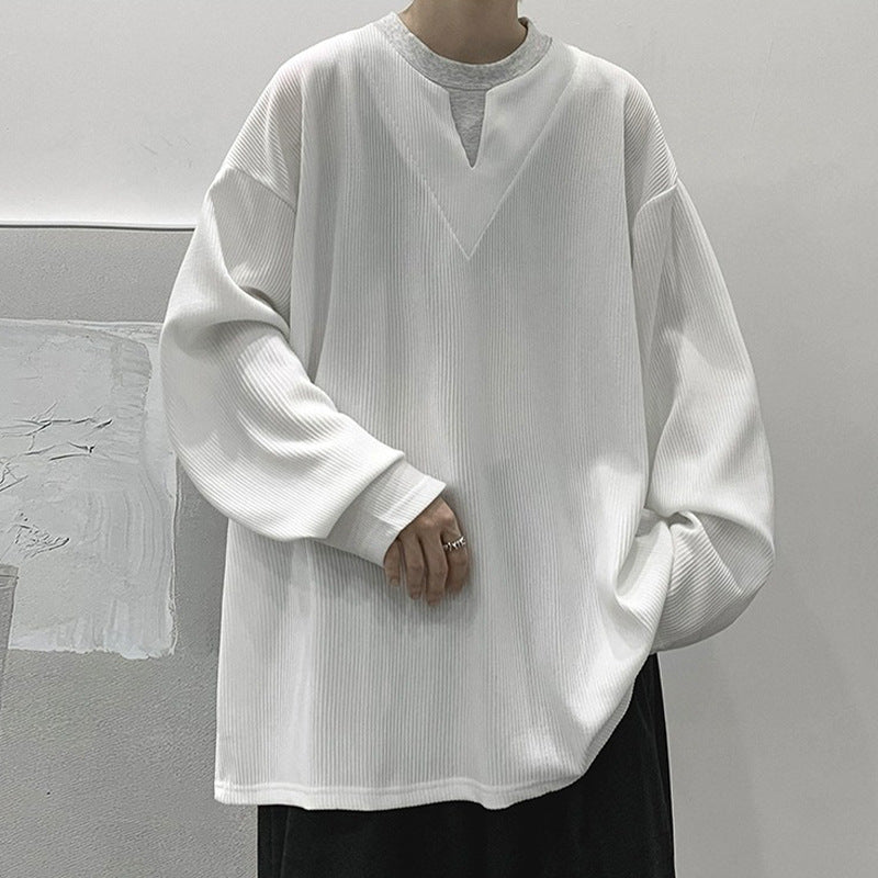 Dame afslappet oversized pullover med struktureret design og moderne V-udskæring Stilla