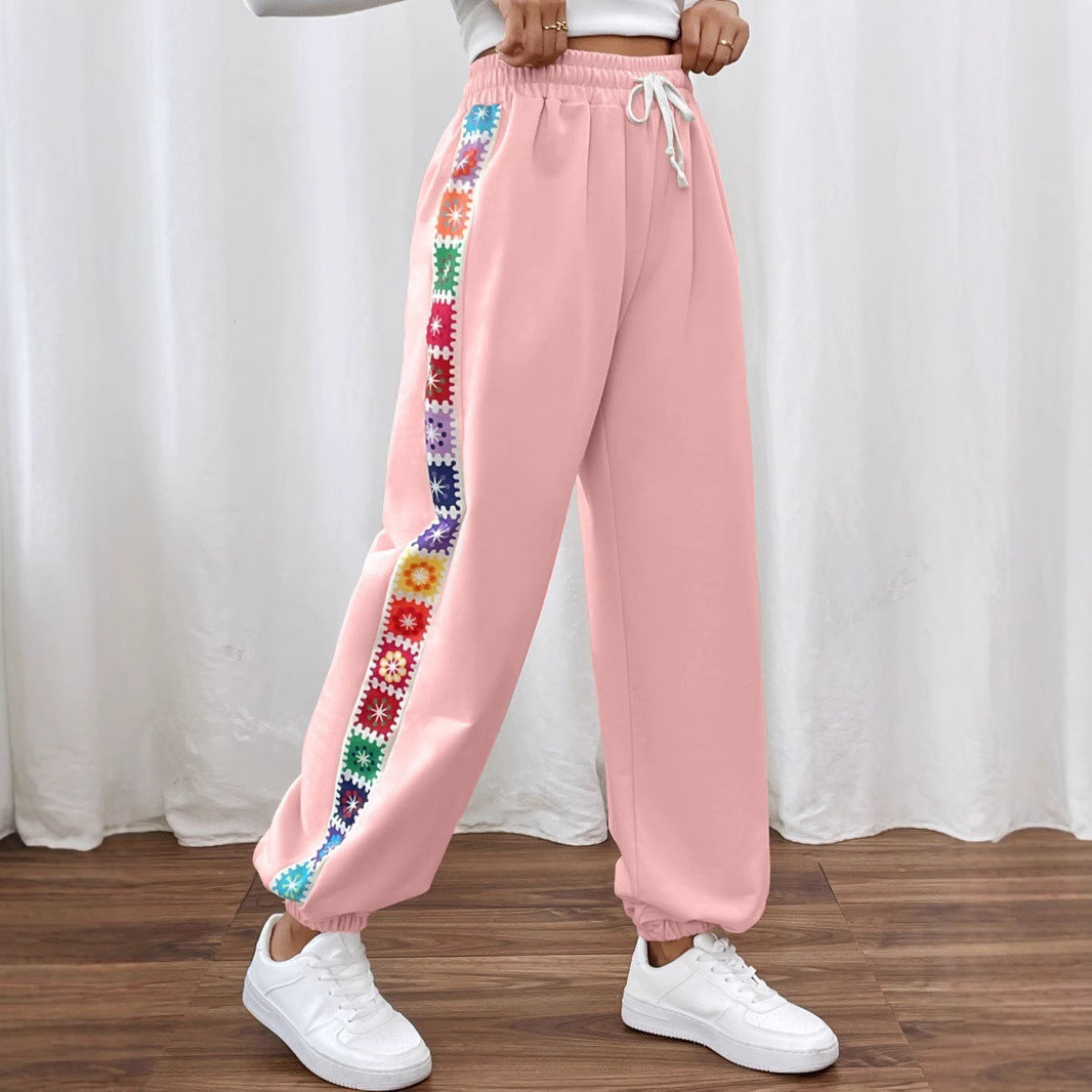 Dame joggingbukser med floral sidebånd Stilla