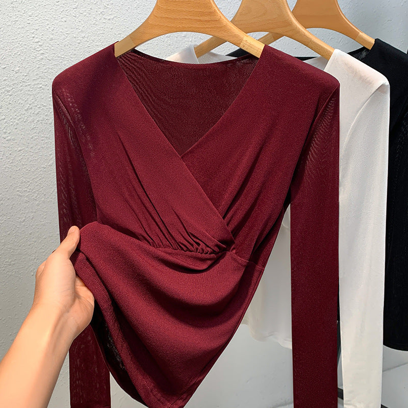 Dame elegant indpakningsbluse lavet af flydende materiale med raffinerede draperingsdetaljer Stilla