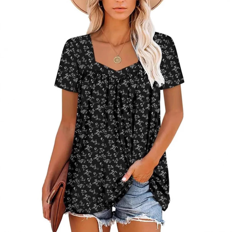 Dame afslappet blomster-top med V-hals og løs pasform Stilla