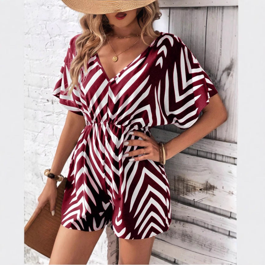 Dame moderigtig jumpsuit med omfattende indpakningslook og grafisk mønster Stilla