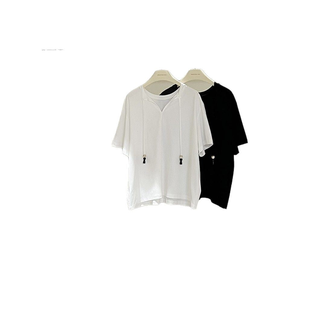 Dame afslappet kortærmet skjorte med hætte og justerbar kant Stilla