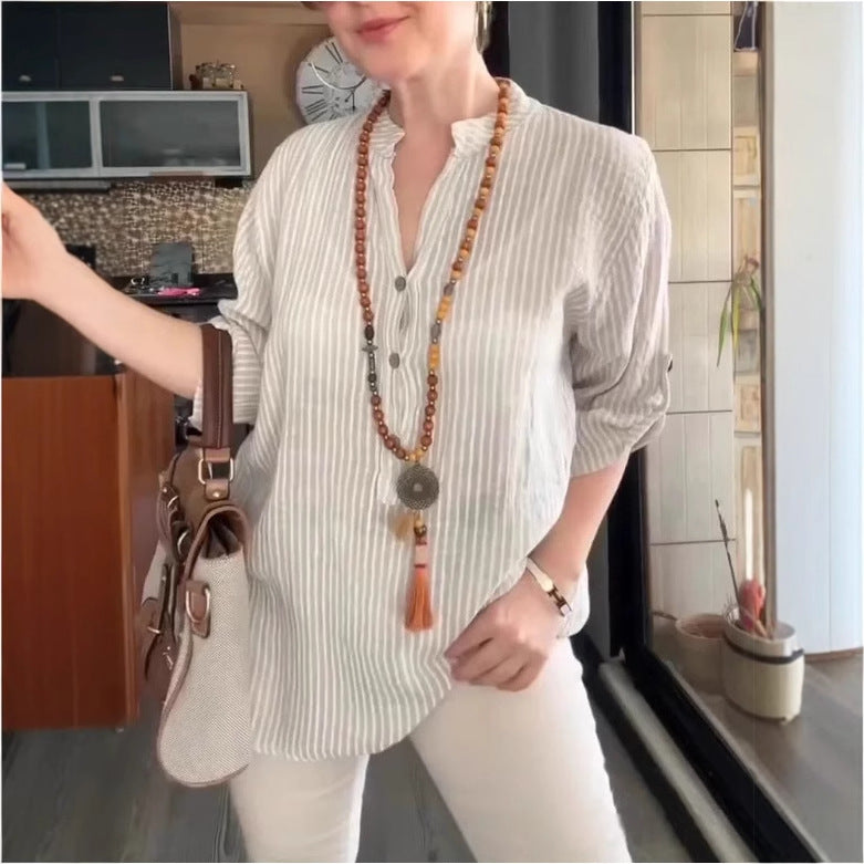 Dame afslappet bluse med knaplukning og stribemønster Stilla