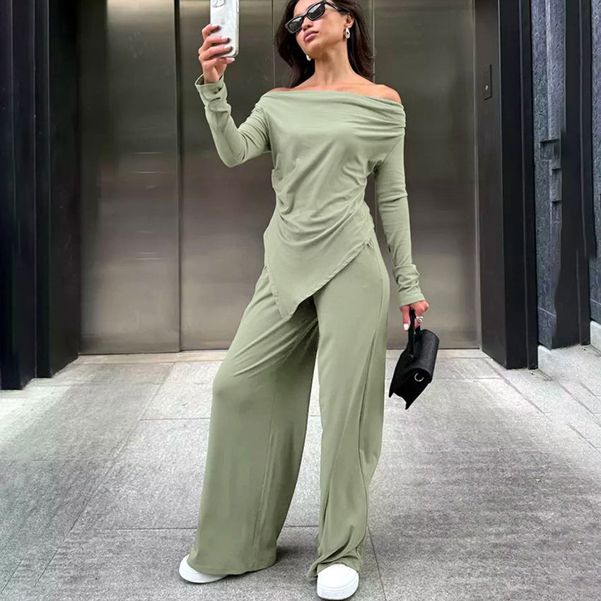 Dame jumpsuit med off-shoulder design og elegant draperet stof Stilla