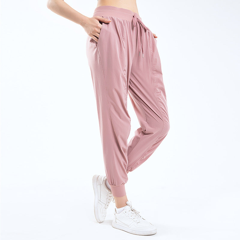 Dame afslappet sportbukser med elastisk talje og sidelommer med lynlås Stilla