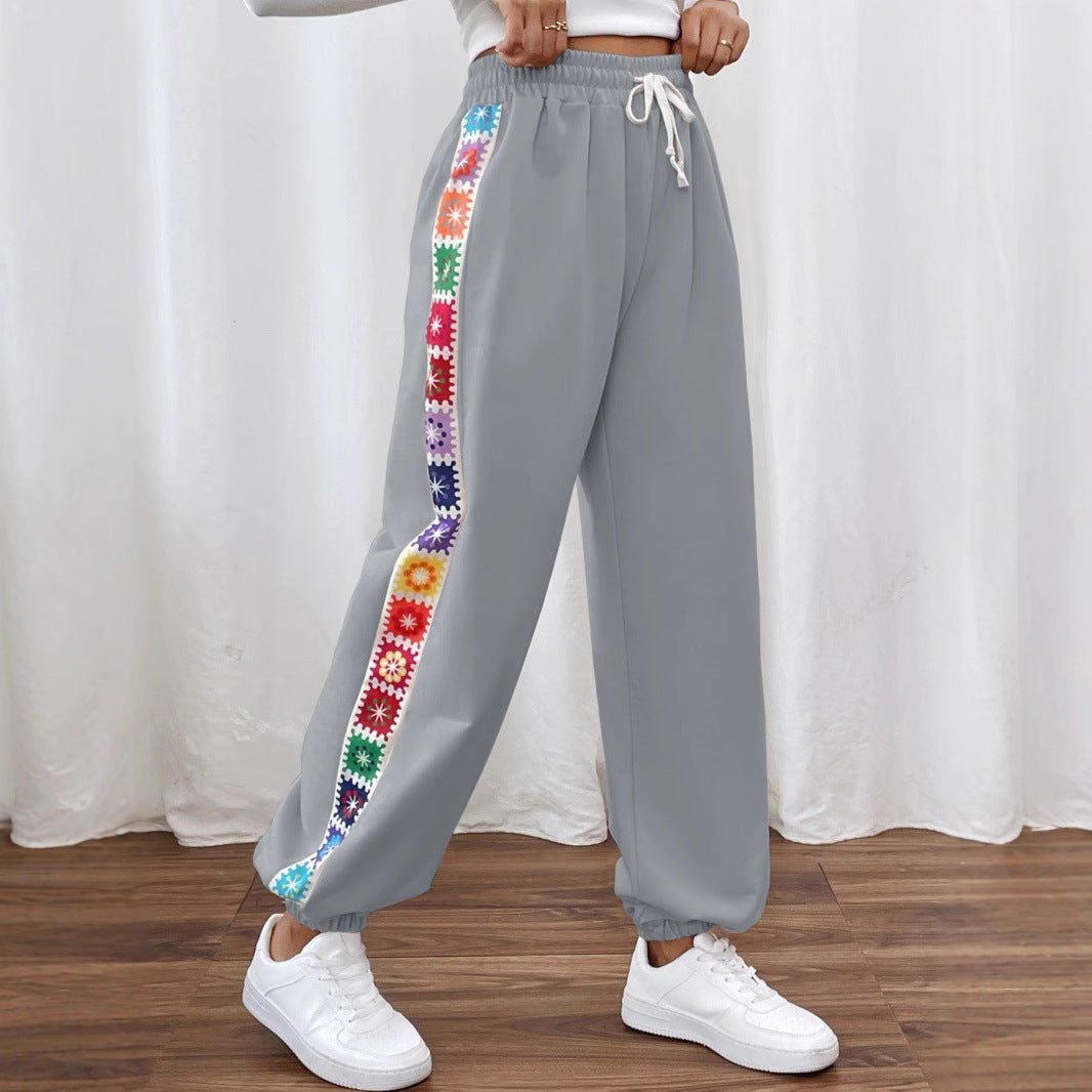 Dame joggingbukser med floral sidebånd Stilla