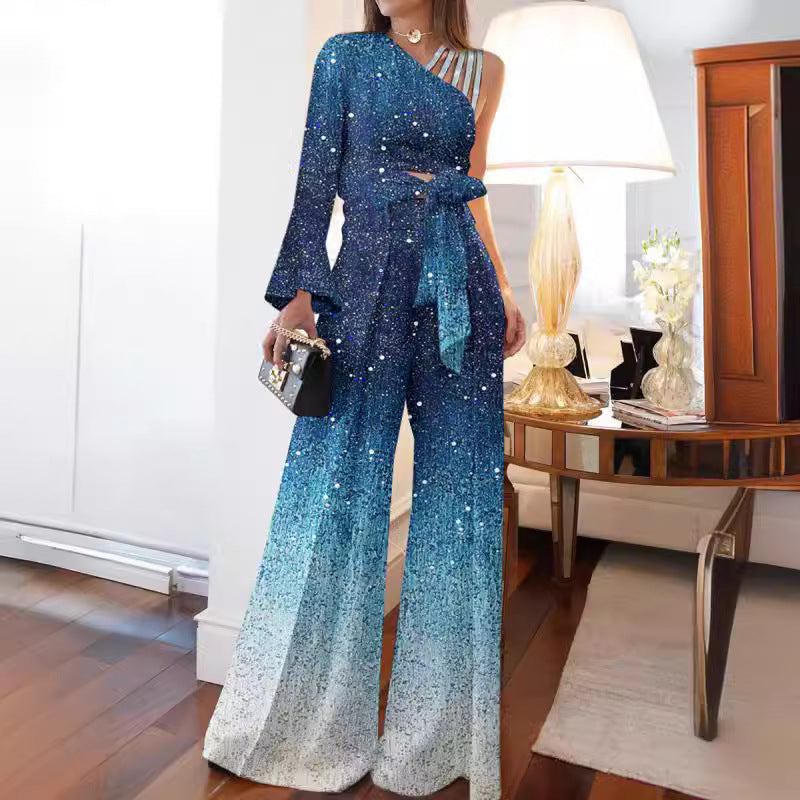 Dame elegant ensidig jumpsuit med glimmerdetaljer og bred ben Stilla