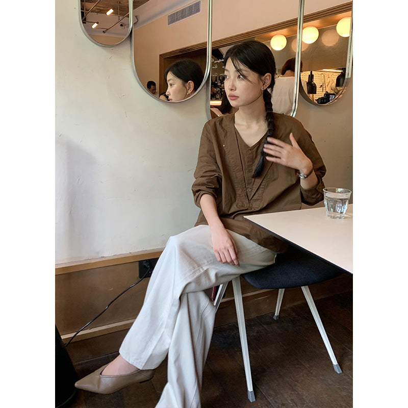 Dame afslappet langærmet skjorte med struktureret udskæring og knapdetaljer Stilla