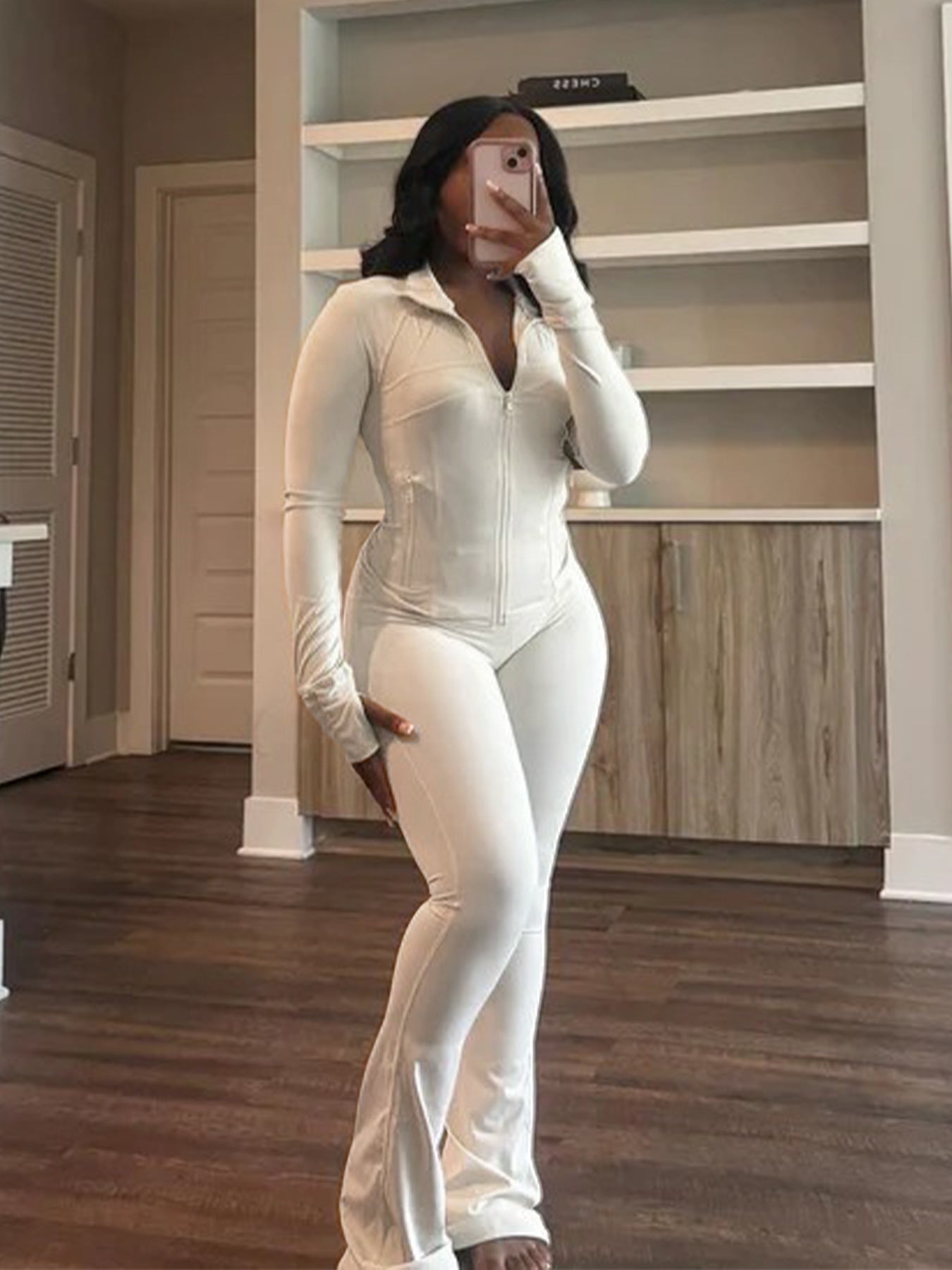 Damer Sporty Langeærmet Jumpsuit i Stretch-materiale med Lynlås Stilla