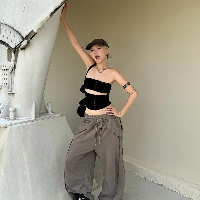 Dame Crop-top med raffineret knapdetalje og frækt design Stilla