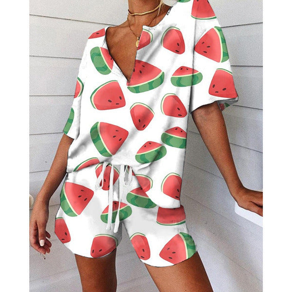 Dame jumpsuit med frugtagtig melonemønster og afslappet snit Stilla