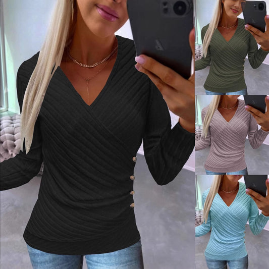 Dame elegant indpakningstop med struktureret design og dekorative knapper Stilla