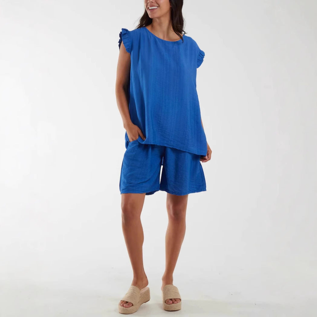 Dame afslappet kortærmet sæt med flæsedetaljer og praktiske lommer Stilla