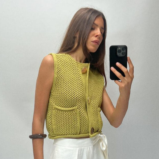 Dame strikvest med gennembrudt struktur og praktiske lommer Stilla