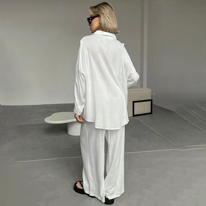 Dame afslappet bluse lavet af let hørstof med overliggende skuldre og knapdetaljer Stilla