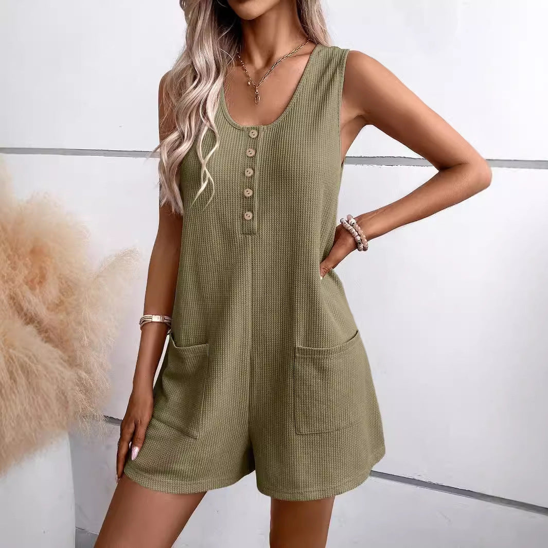 Dame afslappet jumpsuit i åndbart vaffelmønster med knaplukning og praktiske lommer Stilla