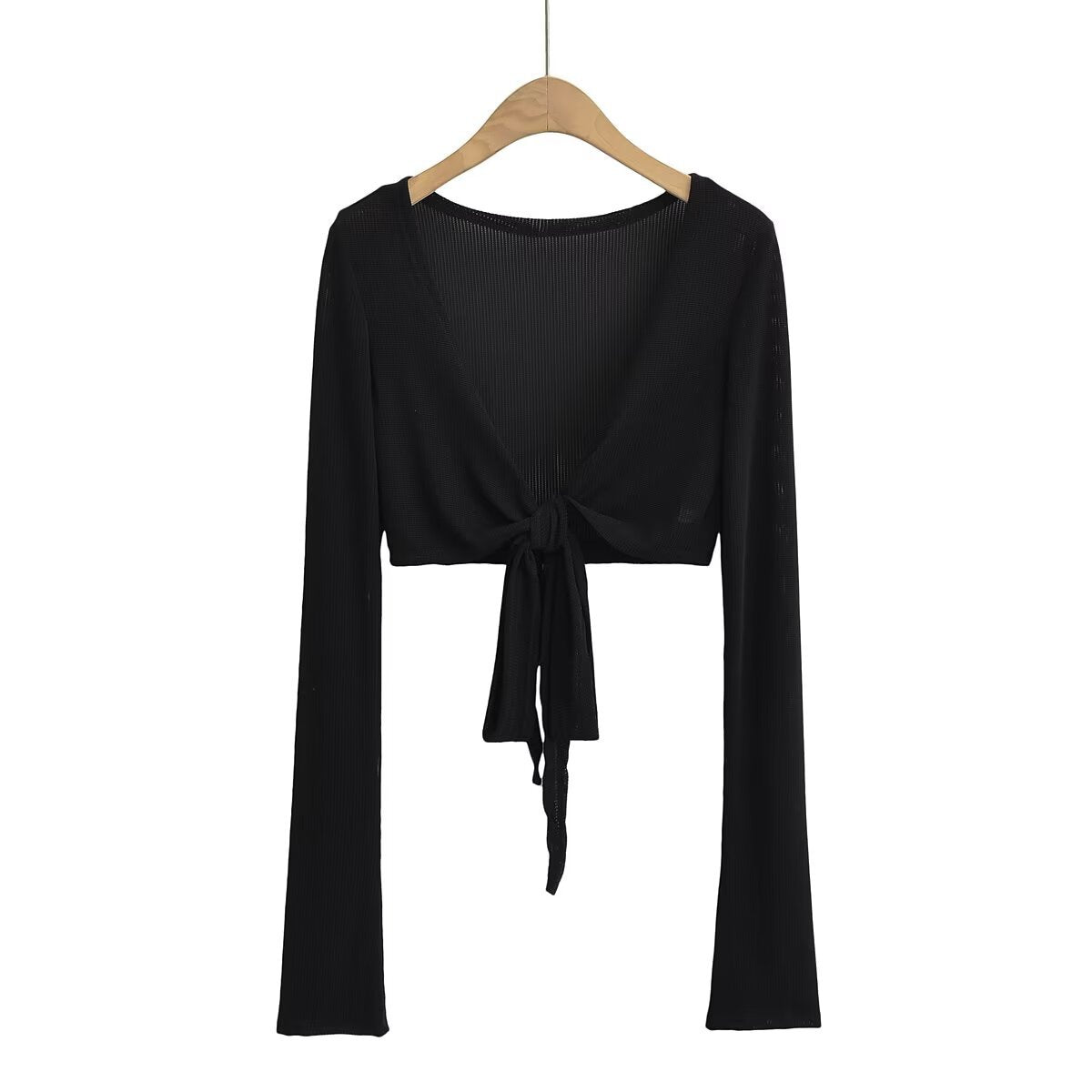 Dame cropped langærmet top med raffineret knude-design og elastisk stof Stilla