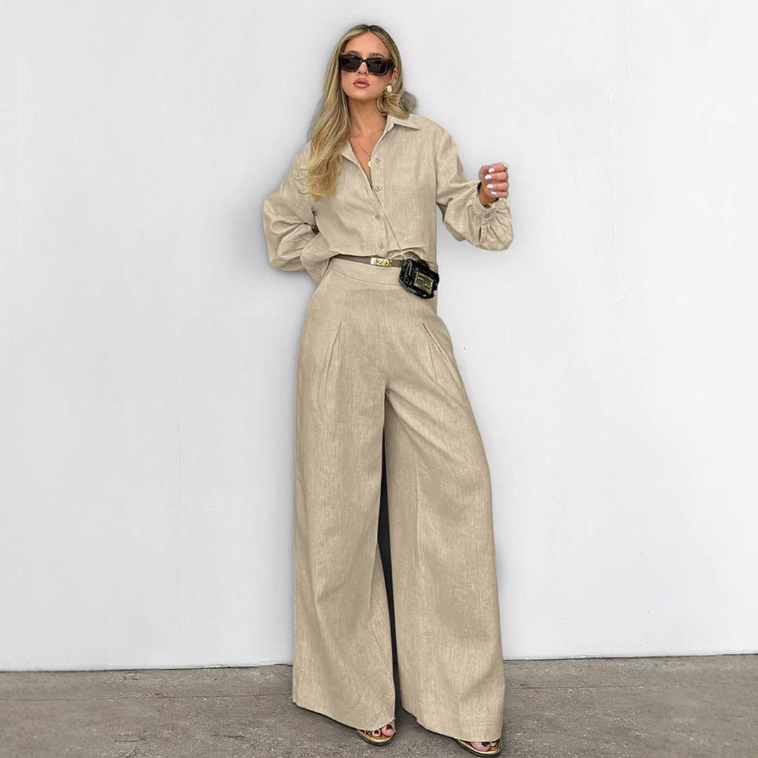 Dame elegant erhvervssæt med figursyet bluse og løst skåret bukser Stilla