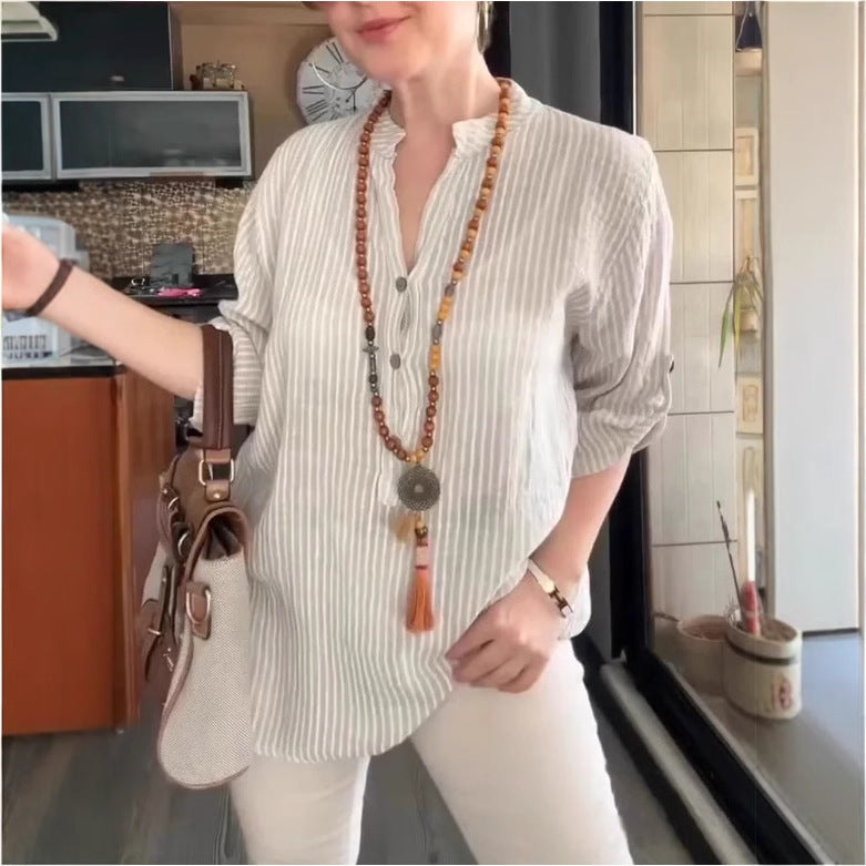 Dame afslappet bluse med knaplukning og stribemønster Stilla