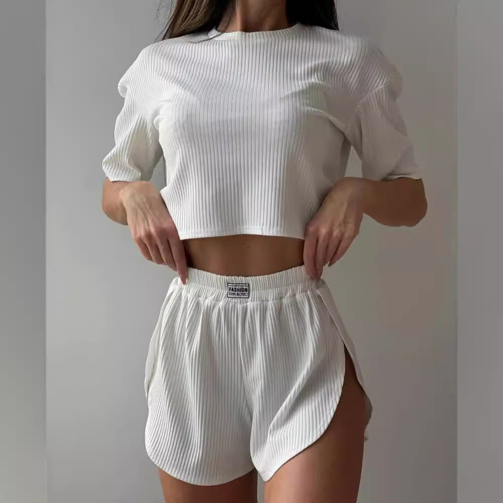 Dame afslappet kort pyjamasæt i åndbar ribstruktur Stilla