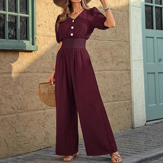 Dame jumpsuit med elastisk talje og knapdetalje Stilla